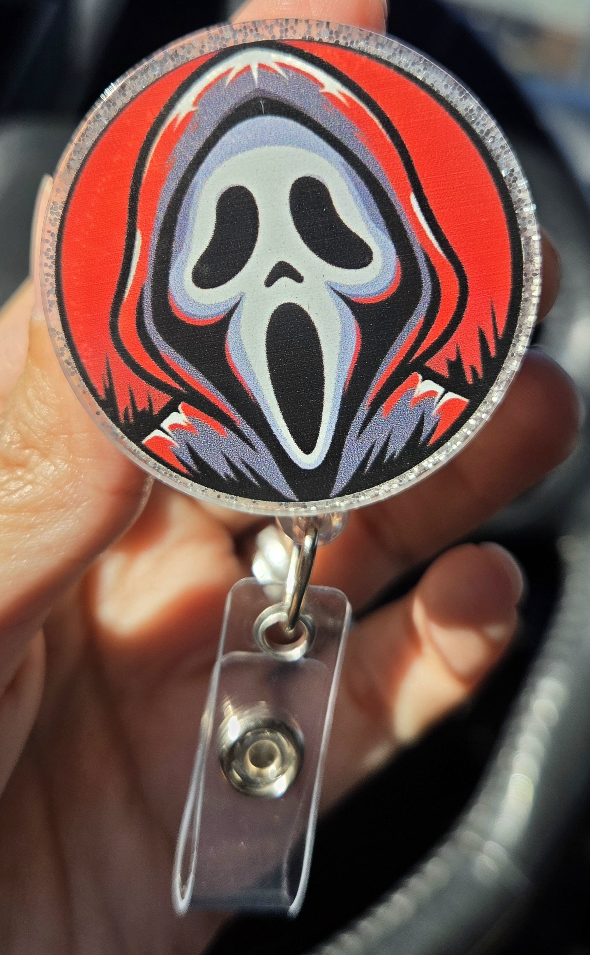 Red background ghost face badgereel